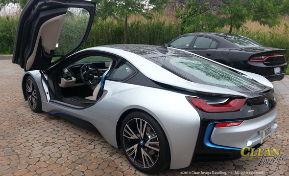 BMW electric sports car with door open.