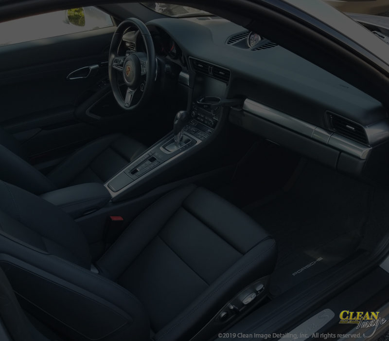 White Porsche 911 interior detailing.