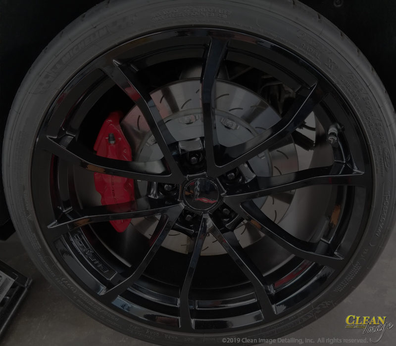 Black Corvette Z06 rim detailed and protected with Ceramic Pro.