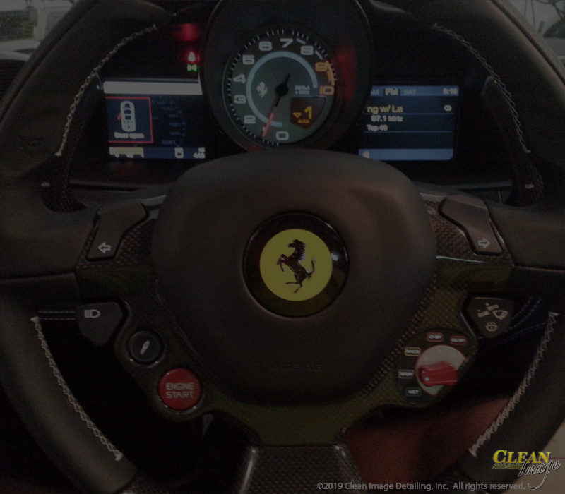 Ferrari steering wheel after interior steam cleaning.